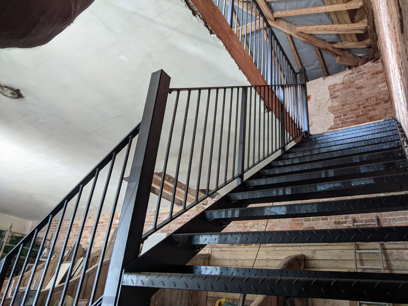 Internal access steel staircase 